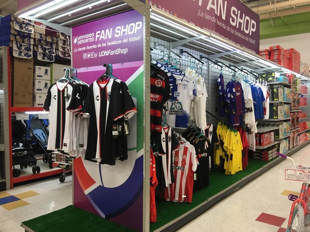 Univision Deportes Fan Shop retail display of soccer jerseys